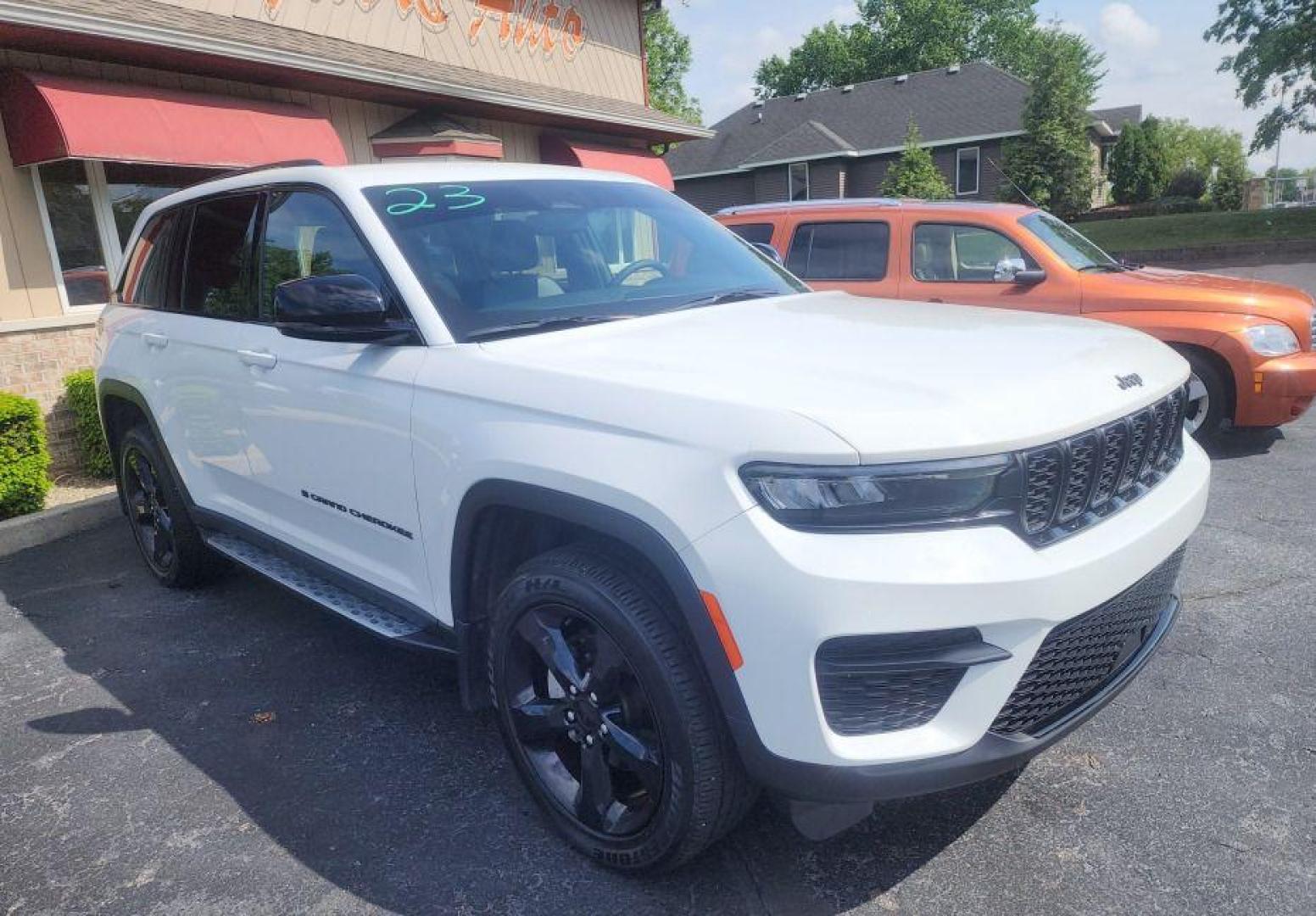 2023 WHITE JEEP GRAND CHEROKEE LAREDO - 4WD (1C4RJHAG7PC) with an 3.6L engine, Automatic transmission, located at 101 S. Halleck St., DeMotte, 46310, (219) 987-2922, 41.202343, -87.198189 - Photo#2