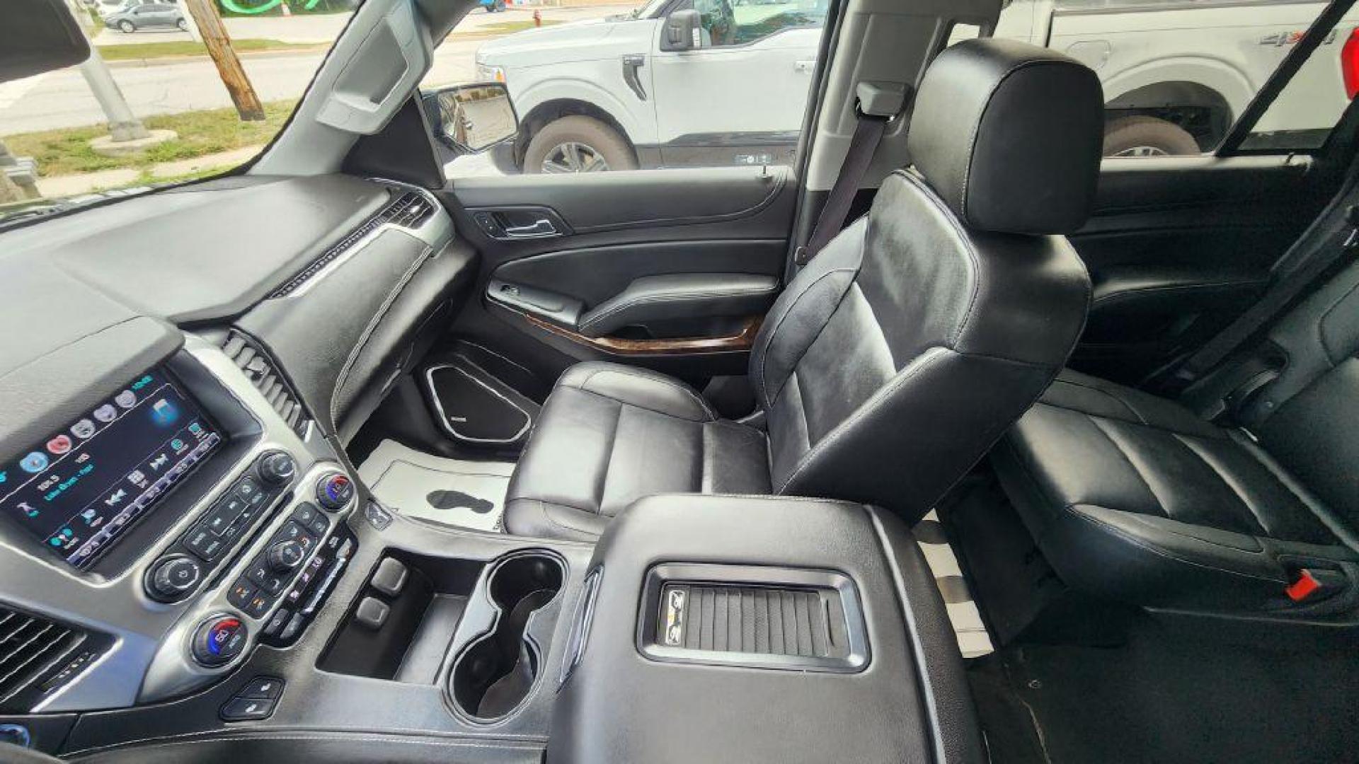 2016 BLACK CHEVROLET TAHOE 1500 LT - 4WD (1GNSKBKCXGR) with an 5.3L engine, Automatic transmission, located at 101 S. Halleck St., DeMotte, 46310, (219) 987-2922, 41.202343, -87.198189 - Photo#11