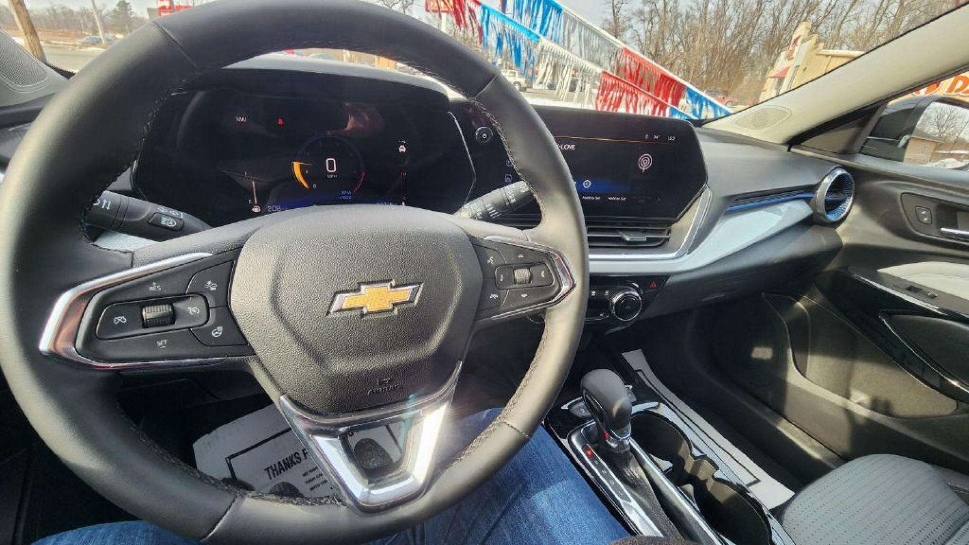 2025 BLACK CHEVROLET TRAX 1LT - FWD (KL77LHEP4SC) with an 1.2L engine, Automatic transmission, located at 101 S. Halleck St., DeMotte, 46310, (219) 987-2922, 41.202343, -87.198189 - Photo#7