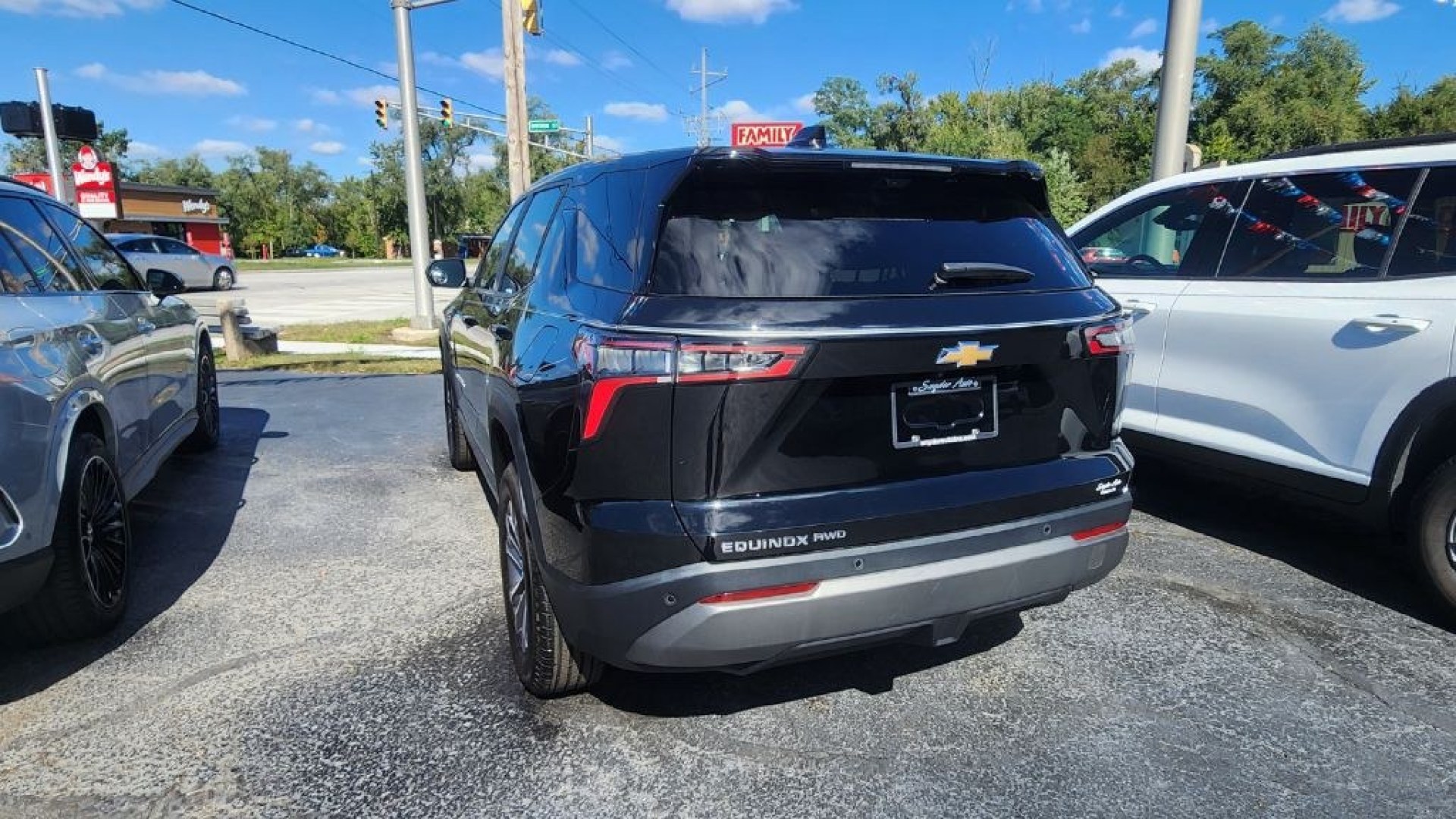2026 BLACK CHEVROLET EQUINOX LT - AWD (3GNAXPEG7TL) with an 1.5L engine, Automatic transmission, located at 101 S. Halleck St., DeMotte, 46310, (219) 987-2922, 41.202343, -87.198189- Photo#3